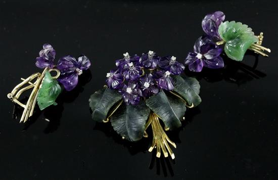 A carved amethyst and jade flower brooch with diamond-set stamens on 18ct gold frame and a similar pair of earrings, pendant 45mm.